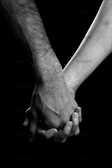 Holding Hands Black And White People. Black and white photo of two